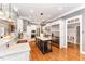 Spacious kitchen with granite countertops, stainless steel appliances, and a large island at 944 Alden Bridge Dr, Cary, NC 27519