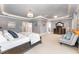 Spacious primary bedroom with sitting area and ensuite access at 944 Alden Bridge Dr, Cary, NC 27519