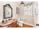 Charming powder room with unique vanity and mirror at 944 Alden Bridge Dr, Cary, NC 27519