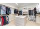 Organized walk-in closet with shelving and storage at 944 Alden Bridge Dr, Cary, NC 27519