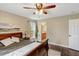 Comfortable bedroom featuring hardwood floors, natural lighting, and neutral decor at 95 Torrington Ave, Franklinton, NC 27525