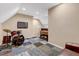 Finished basement space including TV, foosball table, and drum set at 95 Torrington Ave, Franklinton, NC 27525
