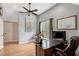 Bright office features a vaulted ceiling, hardwood floors, and ample space for remote work at 95 Torrington Ave, Franklinton, NC 27525