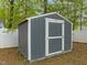 A gray storage shed with white trim offers ample space for tools and equipment at 1015 Castalia Dr, Cary, NC 27513