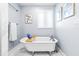 A classic clawfoot tub complemented by natural light and neutral wall colors for a spa-like atmosphere at 1023 Kent St, Durham, NC 27707