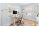 Bright home office with a modern desk, ergonomic chair, and natural light, perfect for remote work at 1023 Kent St, Durham, NC 27707