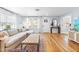 Inviting living room featuring a comfortable sofa, hardwood floors, and stylish decor for relaxed living at 1023 Kent St, Durham, NC 27707