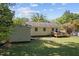 Well-maintained backyard with storage shed, deck, and plenty of open space at 105 E Murray Ave, Durham, NC 27704