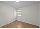 Cozy bedroom featuring wood floors, natural light, and a convenient closet at 105 E Murray Ave, Durham, NC 27704