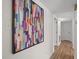 Hallway view featuring modern artwork and durable flooring at 105 E Murray Ave, Durham, NC 27704