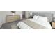 Modern bedroom with gray headboard, neutral walls and ample natural light at 107 Gabriel Ct, Wilson's Mills, NC 27520