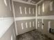 Unfinished bathroom awaiting fixtures and finishes, with neutral walls and potential for customization at 107 Tee Dr, Selma, NC 27576