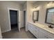 Bright bathroom boasts double sinks, modern fixtures, and plenty of counter space at 107 Tee Dr, Selma, NC 27576