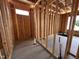 Bathroom framing of a home under construction, with studs and a concrete floor at 107 Tee Dr, Selma, NC 27576