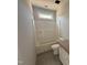 A bathroom featuring a tub/shower combo and tiled flooring at 107 Tee Dr, Selma, NC 27576
