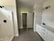 Bathroom featuring large white shower and double sink vanity at 107 Tee Dr, Selma, NC 27576