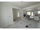 Open-concept interior with white trimwork and views of the kitchen at 107 Tee Dr, Selma, NC 27576