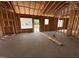 Framing of a home under construction, with windows and a concrete floor at 107 Tee Dr, Selma, NC 27576