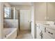 Full bathroom with a separate shower, tub, and white cabinets at 1075 Fairhaven Dr # 51, Mebane, NC 27302
