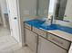 Bathroom featuring a modern vanity, granite countertop, and ample storage space at 1075 Fairhaven Dr # 51, Mebane, NC 27302