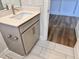 Bathroom with a modern vanity with wood cabinets, light countertops, and tile flooring at 1075 Fairhaven Dr # 51, Mebane, NC 27302