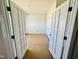 Bright bedroom featuring French doors to an attached room offering versatility and style at 1075 Fairhaven Dr # 51, Mebane, NC 27302
