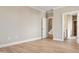 Light-filled bedroom with adjoining access to bathroom and staircase at 1075 Fairhaven Dr # 51, Mebane, NC 27302