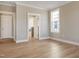 Neutral bedroom with ensuite bathroom access and large window at 1075 Fairhaven Dr # 51, Mebane, NC 27302