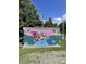 Colorful mural welcomes you to Lake Michael in Mebane, showcasing fun outdoor activities and local charm at 1075 Fairhaven Dr # 51, Mebane, NC 27302