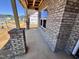 Covered front porch with brick columns, showcasing the new home's exterior at 1075 Fairhaven Dr # 51, Mebane, NC 27302