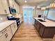 Stylish kitchen features stainless steel appliances, ample counter space, and a center island for culinary enthusiasts at 1075 Fairhaven Dr # 51, Mebane, NC 27302