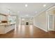Open-concept kitchen and living space, featuring a fireplace, and stainless steel appliances at 1075 Fairhaven Dr # 51, Mebane, NC 27302
