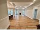 Spacious living room boasts hardwood floors, a fireplace, and abundant natural light, creating a cozy atmosphere at 1075 Fairhaven Dr # 51, Mebane, NC 27302