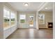 Sun-filled living room with modern windows and fireplace at 1075 Fairhaven Dr # 51, Mebane, NC 27302