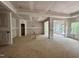 Unfinished living room with multiple windows and open floor plan at 1075 Fairhaven Dr # 51, Mebane, NC 27302