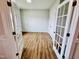 Bright office space featuring hardwood floors and charming French doors that add character to the room at 1075 Fairhaven Dr # 51, Mebane, NC 27302