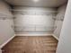 Spacious walk-in closet with shelving, providing ample storage for clothing and accessories at 1075 Fairhaven Dr # 51, Mebane, NC 27302