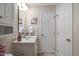Functional bathroom featuring a vanity with plenty of counter space and storage at 108 Braxberry Way, Holly Springs, NC 27540