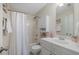 Cozy bathroom with a tub and shower combo, and a vanity with storage at 108 Braxberry Way, Holly Springs, NC 27540