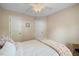 Bedroom featuring neutral colors, two closets, and a serene ambiance at 108 Braxberry Way, Holly Springs, NC 27540