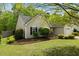 Single-story home featuring a well-maintained lawn, neat landscaping, and an attached one-car garage at 108 Braxberry Way, Holly Springs, NC 27540