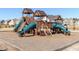 Community playground featuring wood structures with slides and climbing areas, perfect for Gathering fun at 108 Braxberry Way, Holly Springs, NC 27540