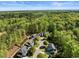 Spacious residential area surrounded by lush greenery, featuring well-maintained homes and mature trees at 12808 Edsel Dr, Raleigh, NC 27613