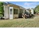 Well-maintained backyard featuring a deck and lush lawn at 12808 Edsel Dr, Raleigh, NC 27613