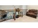 Sitting area with a glass table on the second floor of the house at 12808 Edsel Dr, Raleigh, NC 27613