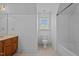 Functional bathroom featuring a single vanity, toilet, and shower-tub combination at 133 Aleah Ct, Clayton, NC 27520