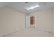 Bedroom with neutral carpeting and natural light coming through an open doorway at 133 Aleah Ct, Clayton, NC 27520