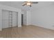 Bedroom with a large closet, neutral walls, and durable laminate flooring at 133 Aleah Ct, Clayton, NC 27520