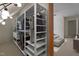 Organized walk-in closet with shelving and clothes racks for ample storage and organization at 133 Aleah Ct, Clayton, NC 27520