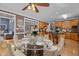 Dining area with seating for six and an open layout that connects to the kitchen at 133 Aleah Ct, Clayton, NC 27520